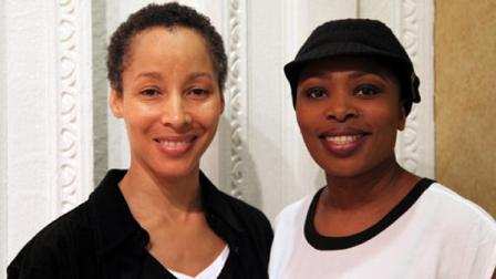 In this Nov. 8, 2012, photo, dancer Camille N. Brown, left, and singer Lindiwe Dlamini pose before a performance of The Lion King in New York. Both women have been in the ensemble of the Broadway hit show for its entire 15-year run. (AP Photo/Mark Kennedy)