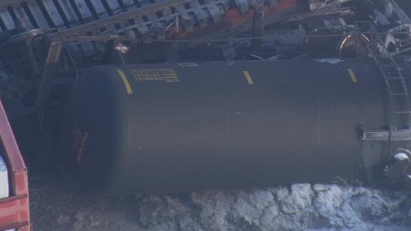 Train carrying chemicals derails into Del. River