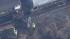 Train carrying chemicals derails into Del. River