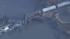 Train carrying chemicals derails into Del. River