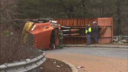 Rig carrying scrap metal overturns in Lawrence Twp.