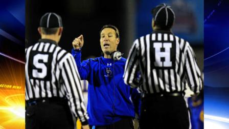 Delaware head coach K.C. Keeler, center, makes a point with game officials during the first half of the FCS Championship NCAA college football game against Eastern Washington, Friday, Jan. 7, 2011, in Frisco, Texas. (AP Photo/LM Otero)