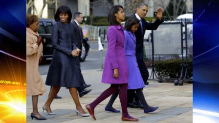 President Barack Obama, waves as he walks with his daughters Sasha and Malia, first lady Michelle Obama and mother-in-law Marian Robinson, to St. Johns Church in Washington, Monday, Jan. 21, 2013, for a church service during the 57th Presidential Inauguration. (AP Photo/Jacquelyn Martin)