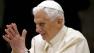 Pope Benedict XVI arrives for his weekly general audience at the Paul VI Hall at the Vatican, Wednesday Feb. 13, 2013. Pope Benedict XVI is telling the faithful in his first public appearance since announcing his resignation that he stepping down for the good of the church. Benedict received a lengthy standing ovation when he entered the packed audience hall Wednesday. He was interrupted by applause by the throngs of people, many of whom had tears in their eyes. At the start of his audience, he repeated in Italian what he had told cardinals Monday in Latin: that he simply didnt have the strength to continue. He said I did this in full liberty for the good of the church. (AP Photo/Alessandra Tarantino)