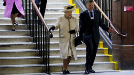 Britains Queen Elizabeth II walks down stairs as she visits Baker Street underground station in London, to mark the 150th anniversary of the London Underground, Wednesday, March 20, 2013. The Queen made her first public engagement in more than a week Wednesday after cancellations following her hospitalization for a stomach bug. The British head of state joined her husband Prince Philip and their granddaughter-in-law, Kate, for the event marking the 150th anniversary of Londons sprawling subway system, affectionately known as the Tube. (AP Photo/Matt Dunham)