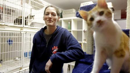 In this Thursday, March 28, 2013 photo, Red Paw founder Jen Leary poses for a portrait at their adoption facility in Philadelphia, with kittens displaced due to fires. The emergency relief service Red Paw has paired with the local Red Cross to care for animals displaced by flames, floods or other residential disasters, with the goal of eventually reuniting them with their owners. (AP Photo/Matt Rourke)