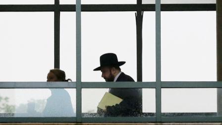 Yosef Kolko, 39, arrives through an enclosed walkway at the Ocean County Courthouse in Toms River, N.J. on Thursday, May 9, 2013, for his trial on charges he sexually abused a boy. The yeshiva teacher was working in 2007 at a camp run by an Orthodox Jewish school when he met the boy, then 11. Prosecutors say the boys parents were pressured by members of their Orthodox Jewish community to drop the charges and let a rabbinical court deal with them. (AP Photo/Mel Evans)