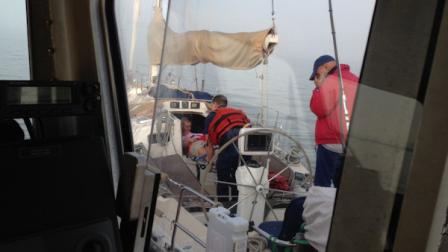 Crewmembers from Coast Guard Station Cape May, N.J., medically evacuate a 57-year-old woman from the 42-foot sailing vessel Affinity near Cape May Sunday, June 9, 2013. The woman, who was experiencing chest pain, back pain and difficulty breathing, was transferred to personnel from the Cape May Fire Department. U.S. Coast Guard photo