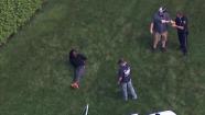 Chopper 6 over the scene in Lower Merion where a suspected bank robber was caught by police. The search for another has prompted the lockdown of Villanova University.