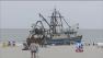 Fishing boat runs aground on AC