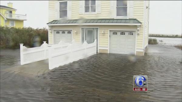 Streets flood as storm hits shore communities