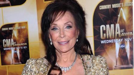 FILE - In this Nov. 10, 2010 file photo, singer Loretta Lynn poses in the press room during the 44th Annual Country Music Awards in Nashville, Tenn. Newly discovered documents indicate country music legend Loretta Lynn is three years older than she has led people to believe, a change that undermines the story told in Coal Miners Daughter. (AP Photo/Evan Agostini, File)