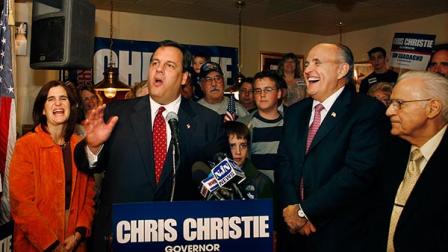 Then Republican candidate for New Jersey governor Chris Christie tells a funny campaign story as wife Mary Pat Christie, left, and former New York Mayor Rudy Giuliani, right, laugh during a campaign stop Friday, Oct. 30, 2009, in West Milford, N.J.