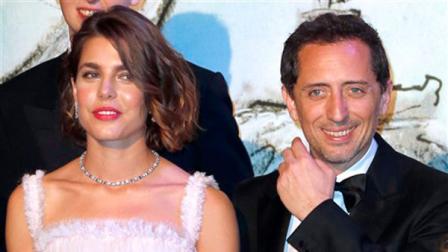 FILE - In this March 23, 2013 file photo, Charlotte Casiraghi and French-Moroccan actor Gad Elmaleh pose for photographers at the Rose Ball in Monaco. The Monaco royal family has welcomed its newest member: a baby boy born to the daughter of Princess Caroline. The palace announced Wednesday, Dec. 18, 2013, that Charlotte Casiraghi gave birth to Raphael a day earlier. Her partner and the babys father is the French actor and comedian Gad Elmaleh. (AP Photo/ Valery Hache, Pool; File)
