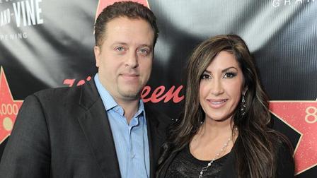 FILE - This Nov. 30, 2012 file photo originally released by Walgreens shows Chris Laurita, left, and his wife Jacqueline Laurita, of The Real Housewives of New Jersey, at Walgreens 8000th Store Opening in Los Angeles. A Paramus man claims Jacqueline and Christopher Laurita and Giuseppe Joe Gorga attacked him as cameras rolled in a hair salon in Ridgewood on Saturday, March 30. John Karagiorgis filed a complaint, accusing the three of simple assault and making terroristic threats. The reality stars responded with their own complaints. (AP Photo/Walgreens, Jordan Strauss, file)