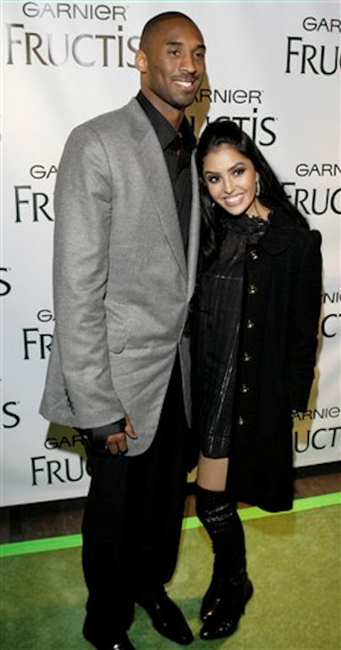 Los Angeles Lakers Kobe Bryant and his wife,...