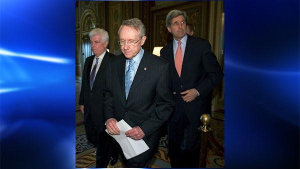 Senate Majority Leader Sen. Harry Reid, D-Nev., center, walks with Sens. Christopher Dodd, D-Conn., left, and John Kerry, D-Mass., to a news conference, Tuesday, May 20, 2008, on Capitol Hill in Washington to talk about the health of Sen. Edward Kennedy, D-Mass. (AP Photo/Haraz N. Ghanbari)