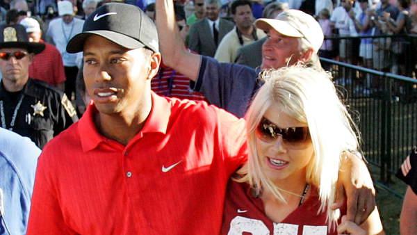 Tiger Woods celebrates with wife Elin Nordegren after winning the 88th PGA Championship golf tournament at Medinah Country Club in this Aug. 20, 2006 file photo, in Medinah, Ill.