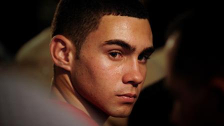 Elian Gonzalez attends an official event with Cubas President Raul Castro, unseen, in Havana, Wednesday, June 30, 2010. Castro and a now 16-year-old Gonzalez attended an official event marking the 10-year anniversary of the time when the former cast away child whose mother died at sea became the center of a politically-charged international custody battle, ending with his repatriation to Cuba and his father. (AP Photo/Adalberto Roque, Pool)