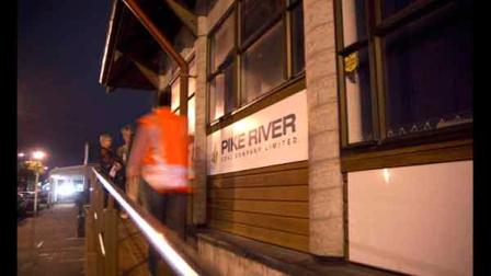 Emergency service personnel and family members of mine staff go into the Pike River offices in Greymouth after an explosion ripped through New Zealands largest coal mine Friday, Nov. 19, 2010.