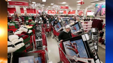 Shoppers take advantage of Black Friday sales in the early morning at a Target store Friday, Nov. 26, 2010, in Chicago. The store opened at 4 a.m. on Friday. (AP Photo/Kiichiro Sato)