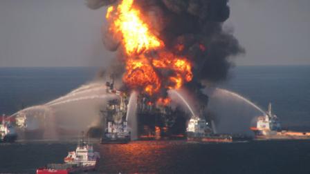 This image provided by the U.S. Coast Guard shows fire boat response crews battle the blazing remnants of the off shore oil rig Deepwater Horizon Wednesday April 21, 2010. The Coast Guard by sea and air planned to search overnight for 11 workers missing since a thunderous explosion rocked an oil drilling platform that continued to burn late Wednesday. (AP Photo/US Coast Guard)