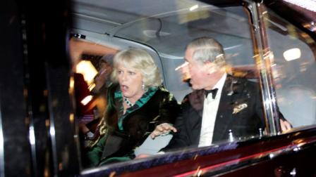 Britains Prince Charles and Camilla, Duchess of Cornwall, react as their car is attacked by angry protesters in London, Thursday, Dec. 9, 2010. An Associated Press photographer saw demonstrators kick the car in Regent Street, in the heart of Londons shopping district. The car then sped off. Charles office, Clarence House, confirmed that their royal highnesses car was attacked by protesters on the way to their engagement at the London Palladium this evening, but their royal highnesses are unharmed. (AP Photo/Matt Dunham)