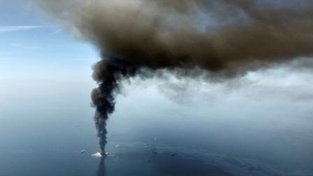 FILE - In this April 21, 2010, file photo, the Deepwater Horizon oil rig burns in the Gulf of Mexico. (AP Photo/Gerald Herbert, File)