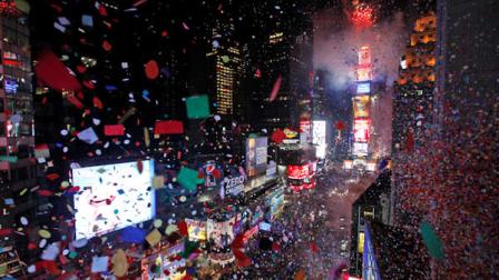 Confetti is seen flying over New Yorks Times Square from the balcony of the Marriott Marquis hotel when the clock struck midnight during the New Years Eve celebration, Friday, Dec. 31, 2010. (AP Photo/Mary Altaffer)