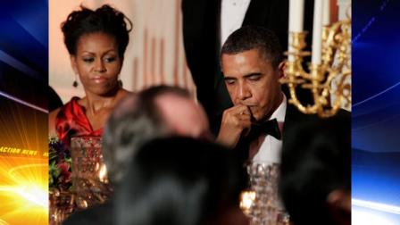 President Barack Obama listens as Chinas President Hu Jintao speaks before offering a toast during a State Dinner at the White House, Wednesday, Jan. 19, 2011, in Washington. At left is first lady Michelle Obama. (AP Photo/Carolyn Kaster)