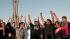 Bahrainis shout slogans in Pearl Square, Manama,...