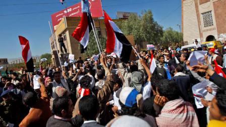 Supporters of the Yemeni government gather as they wave flags and chant slogans, in Sanaa, Yemen, Thursday, Feb. 17, 2011. For seven straight days, protests have hit the capital, Sanaa, and other cities in the Arab worlds poorest country, a mountainous territory wracked by tribal conflicts, armed rebellion and other serious woes.