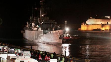 Britain Royal Navy HMS Cumberland carrying British citizens evacuating from Benghazi, arrives at the harbor in Valletta, Malta, Saturday, Feb. 26, 2011. (AP Photo/Gregorio Borgia)