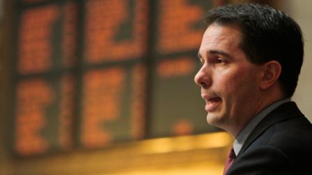 Wisconsin Gov. Scott Walker addresses a joint session of the Legislature at the state Capitol in Madison, Wis., Tuesday, March 1, 2011.