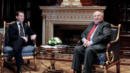 Russian President Dmitry Medvedev, left, and former Soviet leader Mikhail Gorbachev are seen at the Gorki presidential residence on Wednesday, March 2, 2011. Gorbachev has been awarded with Russias highest honor on his 80th birthday. Gorbachev recently has become increasingly critical of Russias current rulers, saying they have taken the country back to the Soviet ways. Painting in background depicts Russian Emperor Peter the Great.