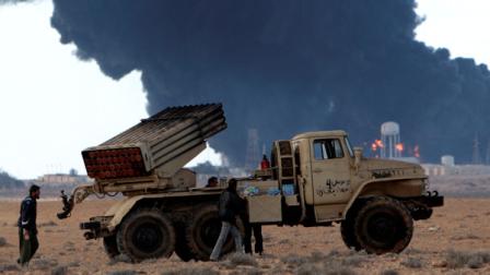 Anti-Libyan Leader Moammar Gadhafi rebels, prepare to fire rockets during fighting against pro- Gadhafi fighters, in Sidra town, eastern Libya, on Wednesday March 9, 2011. A high-ranking member of the Libyan military flew to Cairo on Wednesday with a message for Egyptian army officials from Moammar Gadhafi, whose troops pounded opposition forces with artillery barrages and gunfire in at least two major cities. Gadhafi appeared to be keeping up the momentum he has seized in recent days in his fight against rebels trying to move on the capital, Tripoli, from territory they hold in eastern Libya.