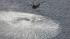 Helicopter dumps water on Japanese reactor