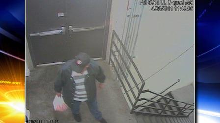 This April 20, 2011 image taken from surveillance video provided by the FBI shows person of interest sought in a fire and the planting of a pipe bomb and two propane tanks near a food court at the Southwest Plaza Mall in Littleton, Colo.