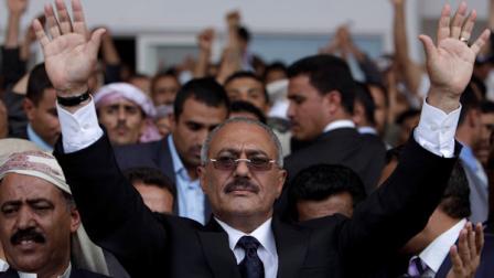 In this photo dated Friday, April 15, 2011, Yemeni President Ali Abdullah Saleh waves to his supporters, not pictured, during a rally in Sanaa,Yemen. Yemens embattled president Saleh agreed Saturday April 23, 2011, to a proposal by Gulf Arab mediators to step down within 30-days and hand power to his deputy in exchange for immunity from prosecution, a major about-face for the autocratic leader who has ruled for 32-years. (AP Photo/Muhammed Muheisen)