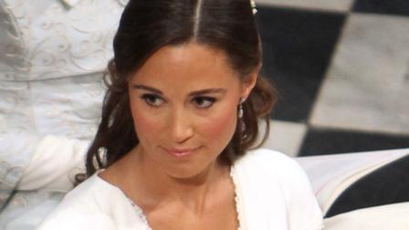 Pippa Middleton, the sister of Kate Middleton, sits in the pews of Westminster Abbey, in London during the wedding ceremony of Prince William and Kate Middleton Friday April 29, 2011.