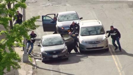 In this photo released by the New York City Police Department, police intercept a vehicle carrying two Americans who allegedly bought guns and a grenade to launch an attack on a New York synagogue, Wednesday, May 11, 2011. According to New York Mayor Michael Bloomberg. Ahmed Ferhani, a 26-year-old of Algerian descent, and Mohamed Mamdouh, a 20-year-old of Moroccan descent, plotted to bomb a major synagogue in Manhattan and bought several weapons and an inert hand grenade from an undercover officer before being arrested. (AP Photo/New York City Police Department)