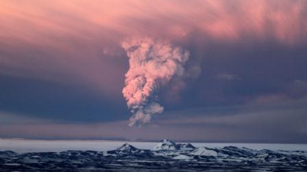 In this photo taken on Saturday, May 21, 2011, smoke plumes from the Grimsvotn volcano, which lies under the Vatnajokull glacier, about 120 miles, (200 kilometers) east of the capital, Rejkjavik, which began erupting Saturday for the first time since 2004. Iceland closed its main international airport and canceled domestic flights Sunday as a powerful volcanic eruption sent a plume of ash, smoke and steam 12 miles (20 kilometers) into the air.