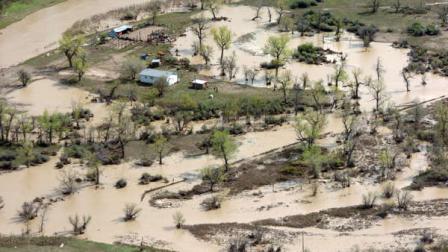 High water along the Little Bighorn River near Crow Agency, Mont. is seen Friday May 27, 2011. Recent flooding displaced hundreds of residents of the Crow Indian Reservation and damaged an estimated 200 homes.