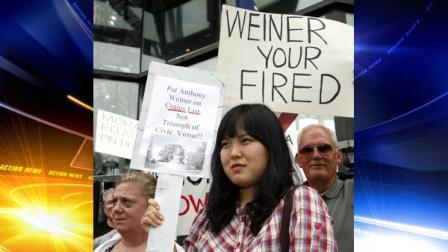 Julie Gu, of South Korea, joins her sister, a Queens resident, at a rally calling for the resignation of U.S. Rep. Anthony Weiner, D-N.Y., in front of the congressmans New York office Sunday, June 12, 2011. Weiner announced Saturday that he was entering professional treatment at an undisclosed location and wanted a leave of absence from Congress. A statement from an aide did not say where he would receive treatment or what type was involved. (AP Photo/David Karp)