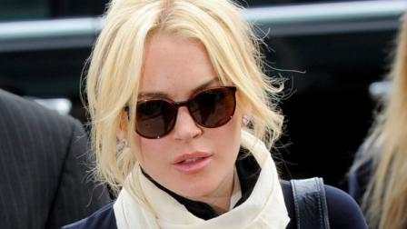 FILE - In this April 22, 2011 file photo, Lindsay Lohan arrives for a preliminary hearing in Los Angeles. The 24-year-old actress says in an article in Life and Style magazine on newstands Friday June 24, 2011 that since being confined to her 3,000-square-foot home in Venice Beach, Calif., shes caught up on movies and TV shows, stayed out of the public eye and, most important, had time to finish decorating her house and patio (AP Photo/Chris Pizzello, File)