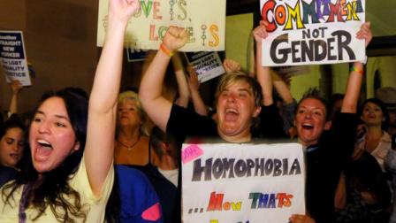 Supporters of same sex-marriage celebrate after Senate members voted and approved the same-sex marriage bill 33-29 during a session of the New York state Senate at the Capitol in Albany, N.Y., Friday, June 24, 2011. (AP Photo/Hans Pennink)