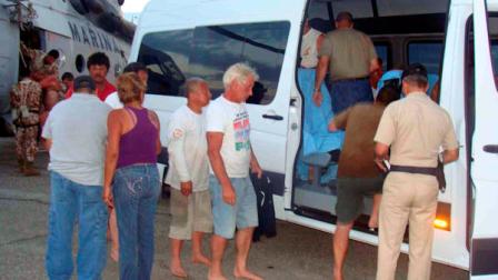 In this image released by the Mexican Navy on Monday July 4, 2011, survivors of a capsized boat are taken away in a vehicle after being rescued by the Navy in the town of San Felipe, Mexico Monday July 4, 2011. A U.S. tourist died after a fishing boat capsized in an unexpected storm in the Gulf of California off the Baja California peninsula and of the 44 people on the boat, seven U.S. tourists remain missing along with one Mexican crew member, the Mexican Navy said. (AP Photo/SEMAR)
