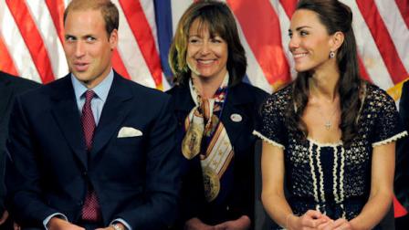 Prince William, the Duke of Cambridge, reacts to his introduction as Kate, Duchess of Cambridge, right, looks on during the Service Nation: Mission Serve Hiring Our Heroes Los Angeles job fair event at Sony Pictures Studios in Culver City, Calif., Sunday, July 10, 2011. (AP Photo/Chris Pizzello)