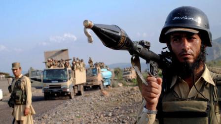 A Pakistani paramilitary soldier secure an area as other troops move toward a forward base during a military operation against militants in Pakistans Khurram tribal region, Saturday, July 9, 2011. A military operation in Kurram tribal region has been launched to clear the area of terrorists involved in all kinds of terrorist activities, including kidnapping and killing of locals, suicide attacks and blocking the road connecting Lower with upper Kurram, Pakistani army spokesman Maj. Gen. Athar Abbas said.
