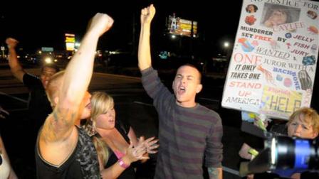 Protestors show their displeasure after Casey Anthony was released from the Orange County Jail in Orlando, Fla., early Sunday, July 17, 2011.
